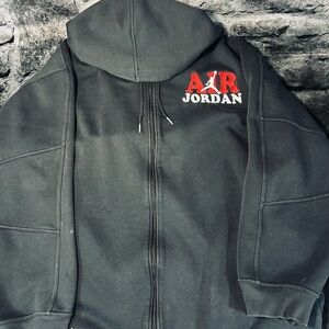 Jordan Black Performance Jacket with Black Medallion